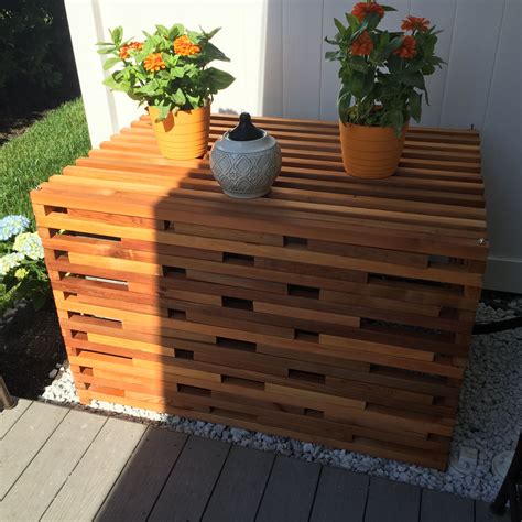 Put plywood over the top of the unit only to shield from snow and ice, weighing it down with bricks or rocks to keep in place. Cedar air conditioner cover | Air conditioner cover, Air ...
