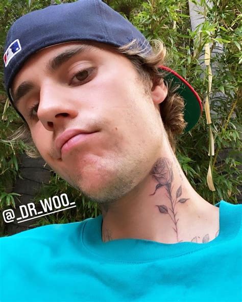 Justin bieber still has selena gomez tattoo despite engagement. Justin Bieber Shows Off New Rose Neck Tattoo by Dr. Woo: Pic