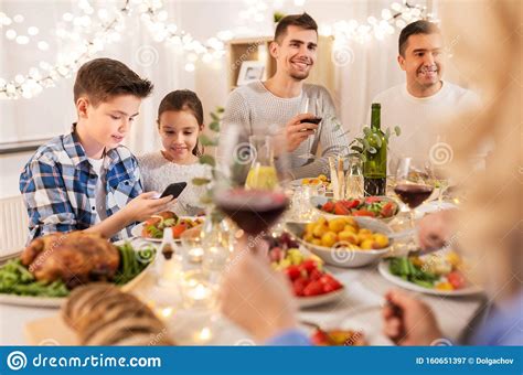 Here's a very detailed murder mystery game that includes a scripted show, as well as an improved show, that's set around your dinner party. Children With Smartphone At Family Dinner Party Stock ...