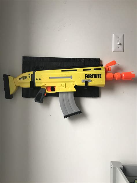 Nerf gun storage toy storage arma nerf boys bedroom decor toy rooms play houses game room home projects shoe rack. Made a rack for my automatic nerf gun : FORTnITE