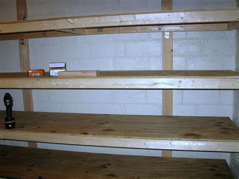 We used two 2″ x 4″ boards, cut to length, as the actual frame. Building Storage Shelves/ Organizing the basement | Built ...