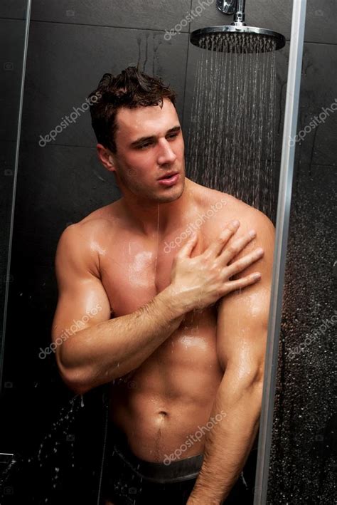 Handsome Man Taking The Shower Stock Photo By Piotr Marcinski