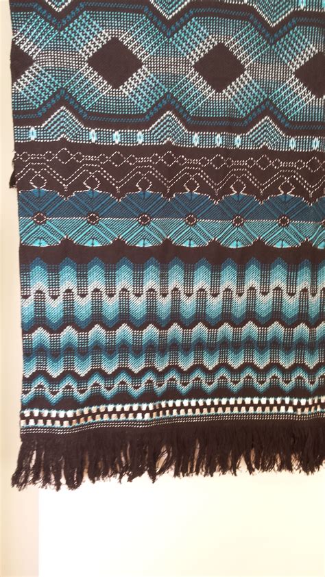 Swedish Weaving On Black Cloth Withe Shades Of Turquoise And Silver