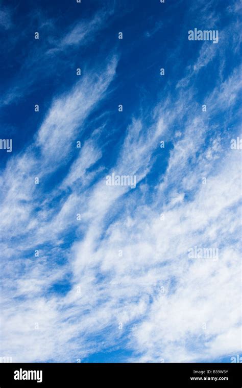 Beautiful Blue Sky With Light Wispy Clouds Stock Photo Alamy