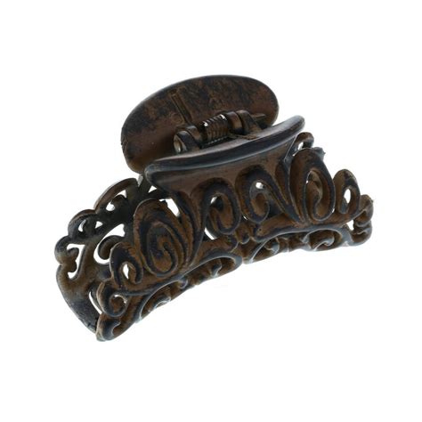 Even more decorative hair clips! Wood Effect Decorative Hair Claw | Claire's