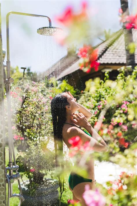 Woman Taking Shower Outside In Tropical Garden Luxury Spa Outdoors