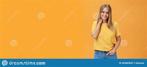 Portrait Of Shy And Timid Feminine Girl With Tan And Straight Fait Hair