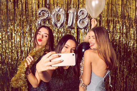 Happy Girls Taking Selfie On New Year Celebration Photo Free Download