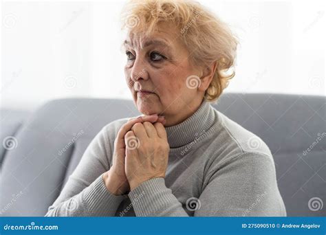 Elderly Woman Keeps Palms In Pray Gesture Closes Eyes Prays And Asks