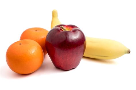 Premium Photo Fresh Fruits With Apple Banana And Oranges On White