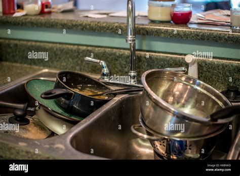 Kitchen Sink Full Dirty Dishes Hi Res Stock Photography And Images Alamy