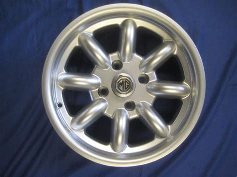 Set Of 4 Mgb 15 X 6j Silver With Polished Rim Alloy Wheels Race