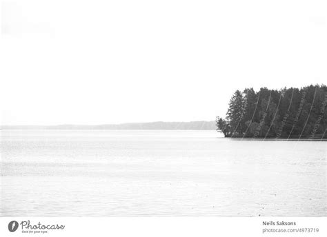 Black And White Landscape With Lake And Clear Sky And Small Island