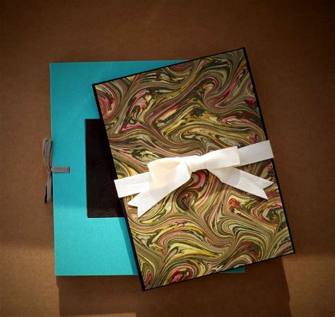 Accordion Books With Marbled Paper And Black Cloth Cover And The
