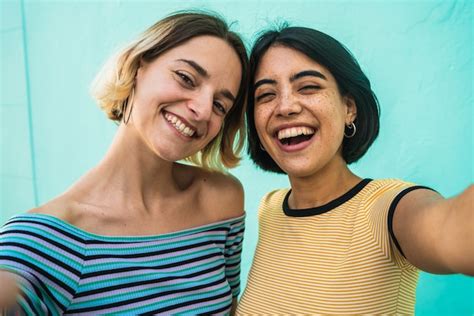 Premium Photo Lovely Lesbian Couple Taking A Selfie