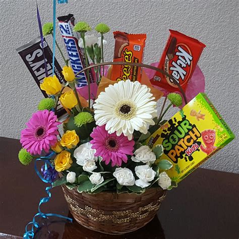 Here you can order chocolate or fresh fruits basket with beautiful flower bouquet ✓ international flower delivery treat your special someone with our delicious gift baskets. Flower and Candy Basket in Leander, TX | Bloom and Leaf