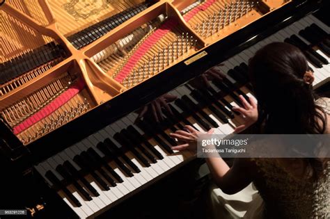 Woman Playing The Piano High Res Stock Photo Getty Images