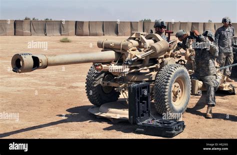 Artillery Crewmen Take Aim On A M198 Howitzer During Training Aug 22