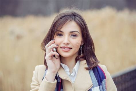 Portrait Happy Smiling Woman Talking On Mobile Cell Phone Standing