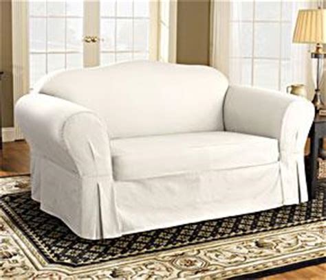 A shopping guide with 10 white slipcovered sofas on a budget, plus why they are the best option for any families with kids and pets. white sofa slipcover