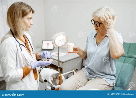 Senior Woman With Gynecologist In The Office Stock Photo Image Of