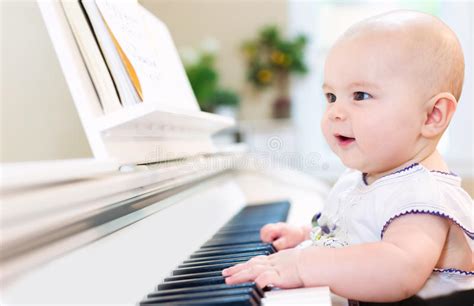 Baby Girl Playing The Piano Stock Image Image Of Baby Learning 77326853