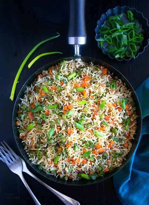 This fried rice is now part of our regular dinner rotation. Vegetable Fried Rice - Indian Style | Video | Nish Kitchen