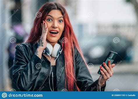 girl in the street with mobile phone surprised stock image image of cellular girl 258891193