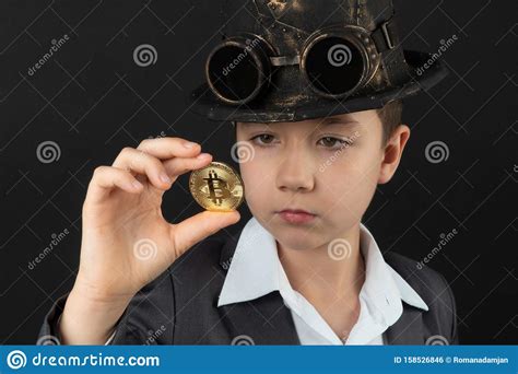 One Bitcoin In The Hand Of Young Boy Concept Stock Photo Image Of