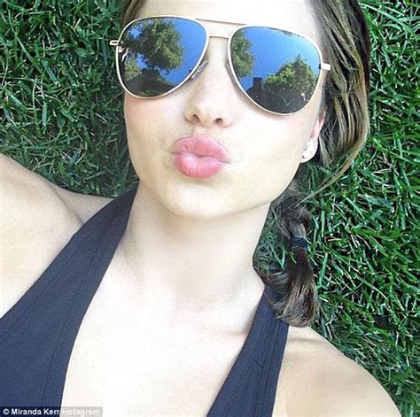 Miranda Kerr Posts Pouty Selfie On Twitter Whilst Relaxing With Son