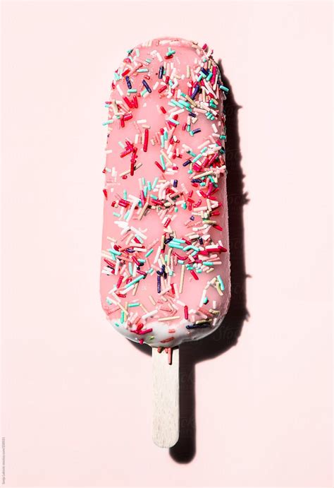 Pink Popsicle With Sprinkles On Pink Background By Sonja Lekovic For