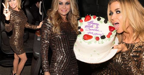 Carmen Electra Celebrates 43rd Birthday With Huge Cake As She Stuns In