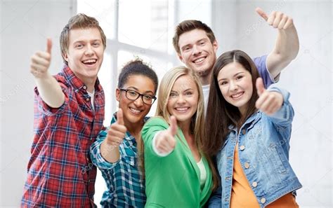 Group Of Happy Students Showing Thumbs Up Stock Photo Affiliate