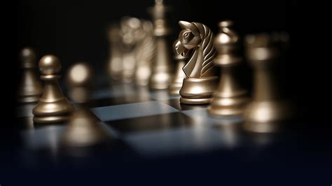 Gold Chess Pieces On A Chessboard Wallpapers And Images Wallpapers