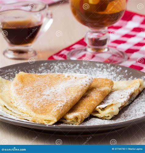 Thin Sweet Pancakes With Powdered Sugar For Breakfast Stock Image
