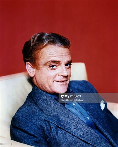 James Cagney Us Actor Wearing A Grey Jacket Over A Blue Shirt With