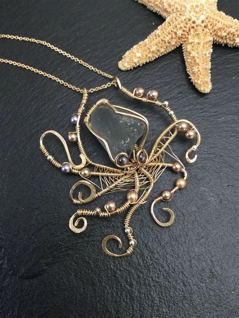 Rare hawaiian light gray seaglass octopus seaglass pendant ...