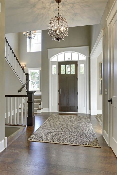 Gorgeous Entryway With High Ceilings Tall Front Door