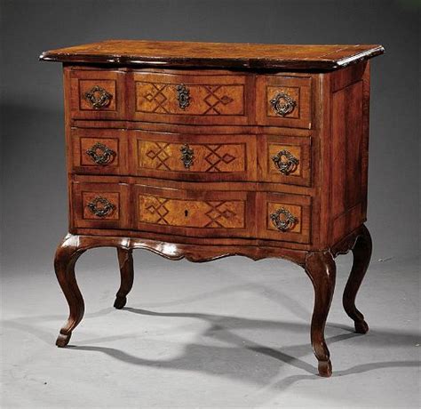 An Italian Rococo Walnut And Parquetry Commode Sep 14 2013 Neal