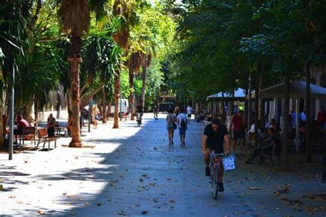 A Day On Charming Calle d'Enric Granados Street In Barcelona