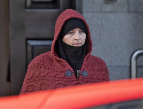 Terror Accused Lisa Smith Pictured Wearing Red Poncho As She Enters