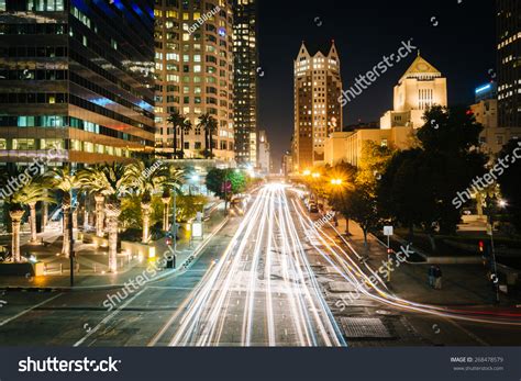 Long Exposure Of Traffic And Buildings Along 5th Street At