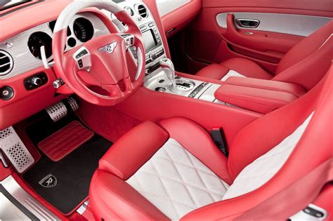 The Interior Of A Red And White Sports Car