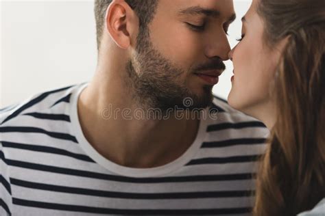 Man Kissing Passionate Young Girlfriend On Beach Stock Image Image Of