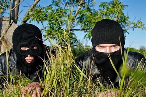 Two Criminals Getting Ready For Robbery Stock Image Colourbox