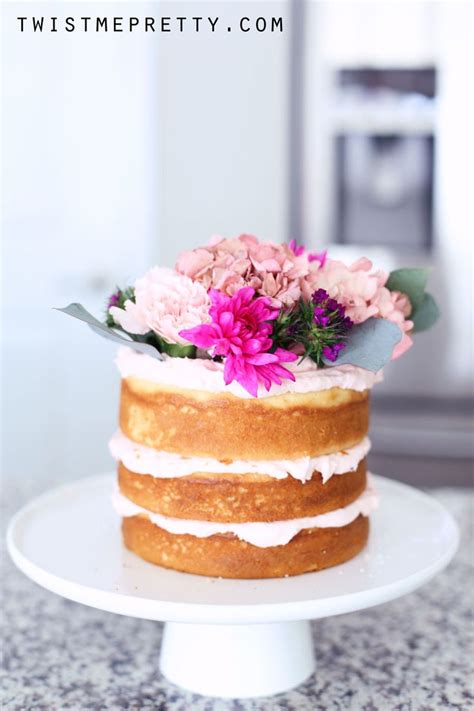 Side View Of A Naked Cake Decorated With Flower Twist Me Pretty
