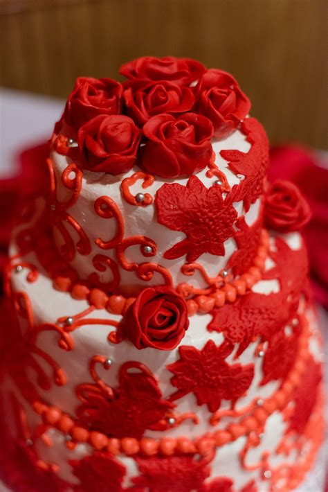 Ivory And Red Rose Wedding Cake