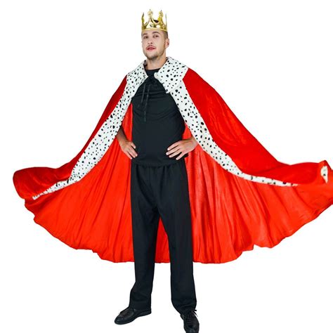 a man in a red cape and black pants is standing with his hands on his hips