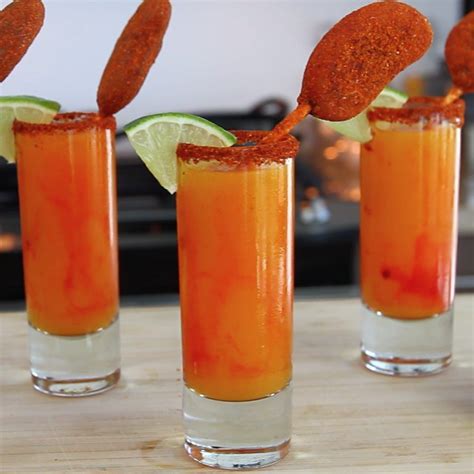 These awesome mango tequila mixed cocktails mix up triple sec, tequila, mango nectar, lime juice, tapatio. Tiny boozy mango shots don't get much better than these ...