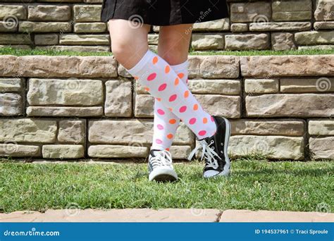 pre teen girl shows off fashion with knee high socks stock image image of miniskirt knees